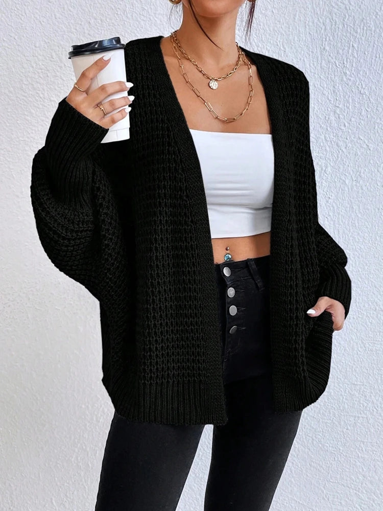 Fashionable and elegant solid color knitted sweater V-neck mid length hollowed out cardigan sweater women's top