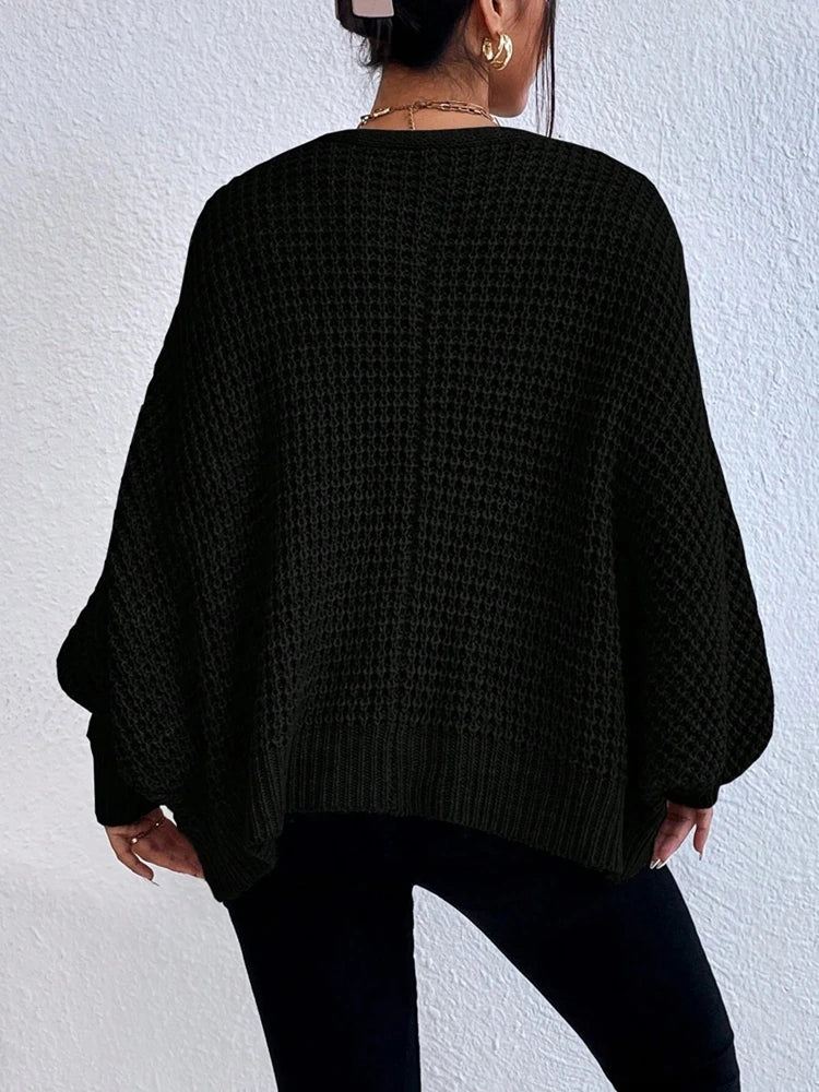 Fashionable and elegant solid color knitted sweater V-neck mid length hollowed out cardigan sweater women's top