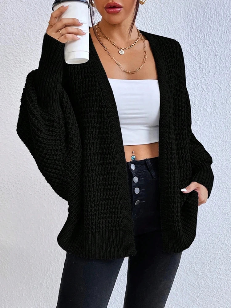 Fashionable and elegant solid color knitted sweater V-neck mid length hollowed out cardigan sweater women's top